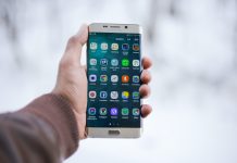 Mobile-First Approach: Designing Pharma Websites for the Modern User Person holding cell phone