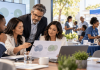 “Health Equity” Disappeared From the Pitch Deck. Did the Marketing Strategy Actually Change? Pharma marketing professionals reviewing a community health strategy while healthcare workers engage patients at a local outreach event.