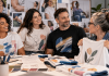 UCB Turned Swag Into Patient Support. That Changes the Role of Campaign Merch. Diverse patient advocates and designers collaborating on custom T-shirts inspired by real patient experiences for a patient-centered pharmaceutical marketing campaign.